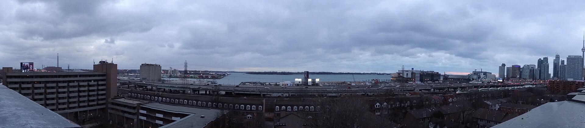 Dusk over the harbour with the city lights coming on
